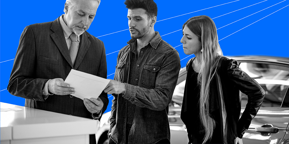 young man and woman asking salesman if they can get a title loan without a car title