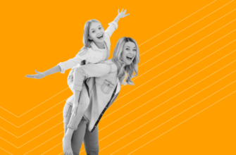 mother giving daughter a piggy back ride