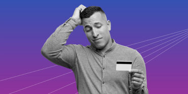man scratching his head wondering how to compare credit cards