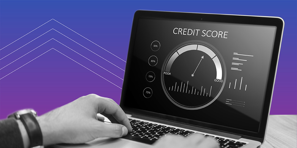 hands typing on a computer to find out how is your credit score determined?